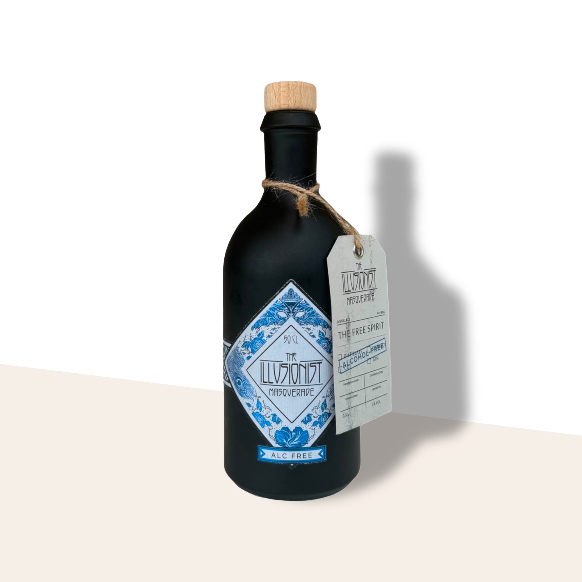 The Illusionist Dry Gin tedesco con botaniche floreali e colore blu che vira al rosa con tonic.